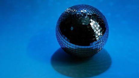 Photo by Tara Winstead: https://www.pexels.com/photo/disco-ball-on-blue-background-8386424/